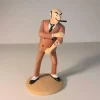 Figurine de Rastapopoulos montrant son tatouage, fabriquée en résine. Modèle réduit pour collectionneur. Taille 12 cm. Ne convient pas aux enfants de moins de 14 ans.