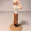 Figurine de Tintin dans le désert regardant à l'horizon, fabriquée en résine. Modèle réduit pour collectionneur. Taille 12 cm. Ne convient pas aux enfants de moins de 14 ans.