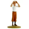 Figurine de Tintin dans le désert regardant à l'horizon, fabriquée en résine. Modèle réduit pour collectionneur. Taille 12 cm. Ne convient pas aux enfants de moins de 14 ans.