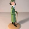 Figurine du professeur Tournesol avec sa bêche, fabriquée en résine. Modèle réduit pour collectionneur. Taille 12 cm. Ne convient pas aux enfants de moins de 14 ans.