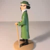 Figurine du professeur Tournesol avec sa bêche, fabriquée en résine. Modèle réduit pour collectionneur. Taille 12 cm. Ne convient pas aux enfants de moins de 14 ans.