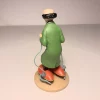 Figurine du Professeur Tournesol - Modèle réduit pour collectionneur. Ces patins, imaginés par Tournesol, sont équipés de petits moteurs qui permettent de se déplacer plus rapidement et sans effort.