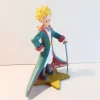 Figurine en résine et peinte à la main du petit prince. Personnages imaginés par St Exupéry qui nous plonge dans l'univers magique et poétique.