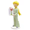 Figurine en résine et peinte à la main du petit prince et la rose. Modèle de collection. Personnages imaginés par St Exupéry qui nous plonge dans l'univers magique et poétique. 