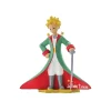 Figurine en résine et peinte à la main du petit prince avec sa cape et son épée. Modèle de collection. Personnages imaginés par St Exupéry qui nous plonge dans l'univers magique et poétique.