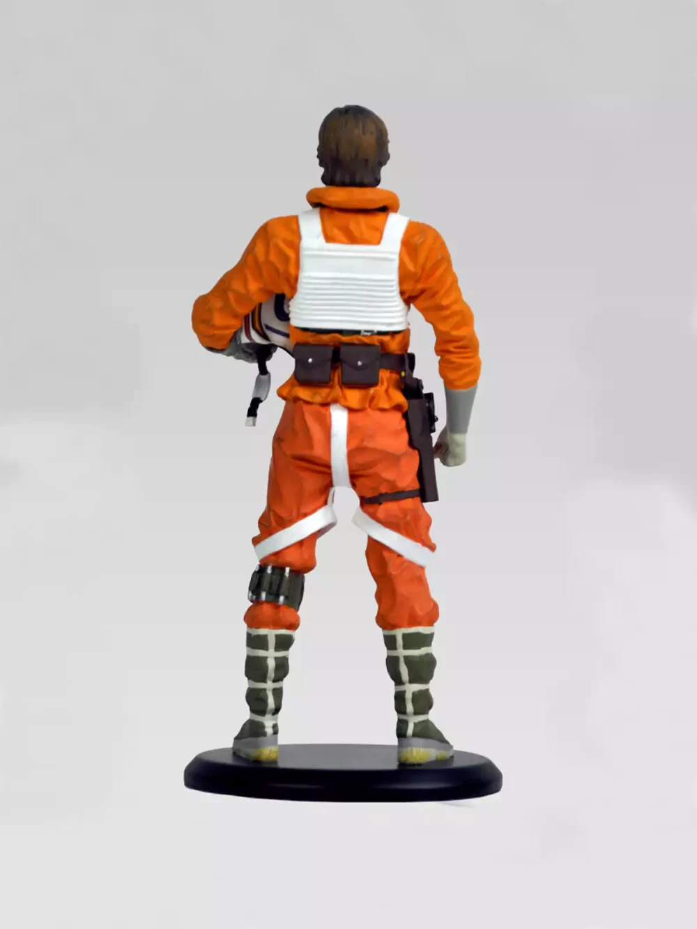 Statue en résine de Luke Skywalker avec sa tenue de pilote. Figurine de collection, tirage à 3000 exemplaires numéroté.