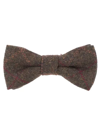 Confectionné dans un tweed de laine mélangée, ce nœud papillon ajoute une touche à la fois traditionnelle et moderne à votre tenue.