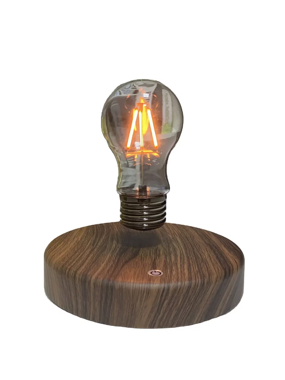 Avec un design rétro et son éclairage LED, l’ampoule est en lévitation à 2 cm du socle, tout en tournant sur elle-même.