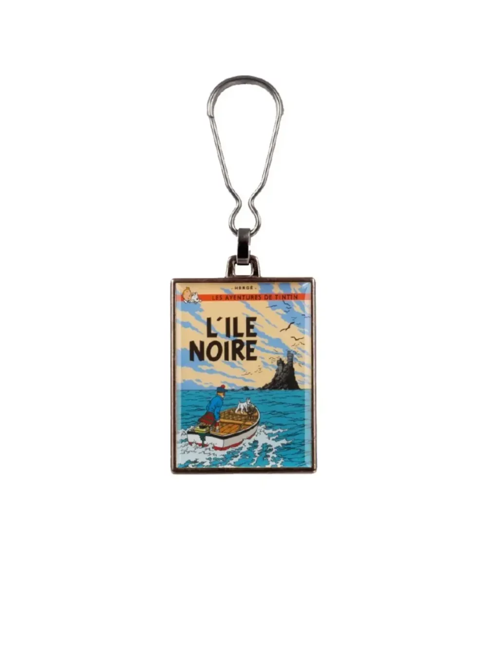 La couverture de l'album "L'ile noire" en porte-clés métallique. Ce porte clés apportera une touche d’amusement et d’aventure à votre quotidien.