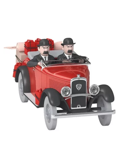 Dans Tintin au pays de l’or noir, les inséparables Dupond et Dupont mènent l’enquête à bord d’un cabriolet rouge. Une auto de style.