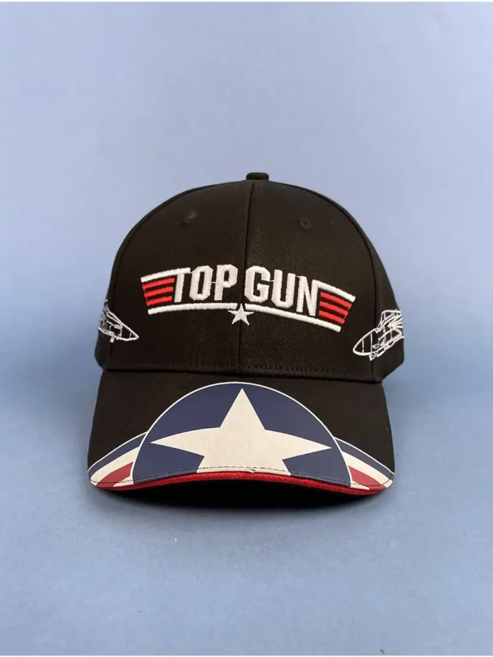 Casquette Top Gun 100% coton, ajustable par velcro. Logo et textes brodés en 3D. taille unique, adulte.