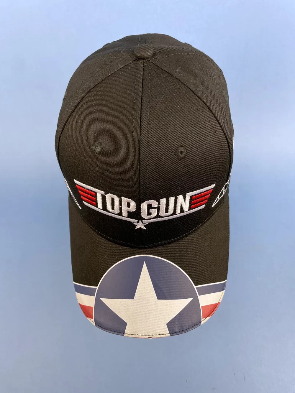 Casquette Top Gun 100% coton, ajustable par velcro. Logo et textes brodés en 3D. taille unique, adulte.