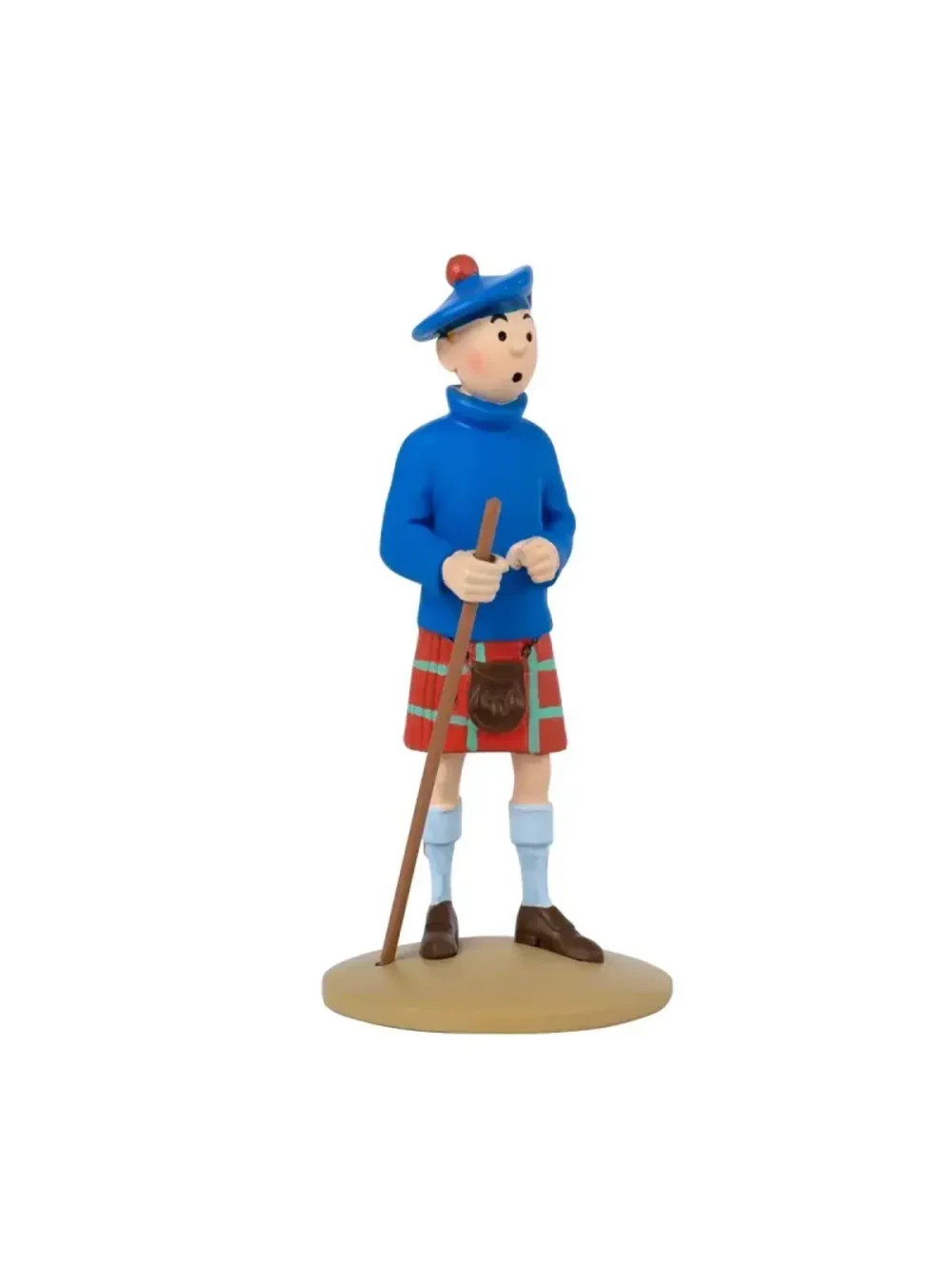 Figurine de Tintin en kilt fabriquée en résine. Modèle réduit pour collectionneur. Taille 15 cm. Ne convient pas aux enfants de moins de 14 ans.